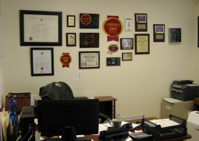 Crack Doctor Head Office With Awards on Wall