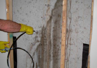 concrete crack wall being repaired shown