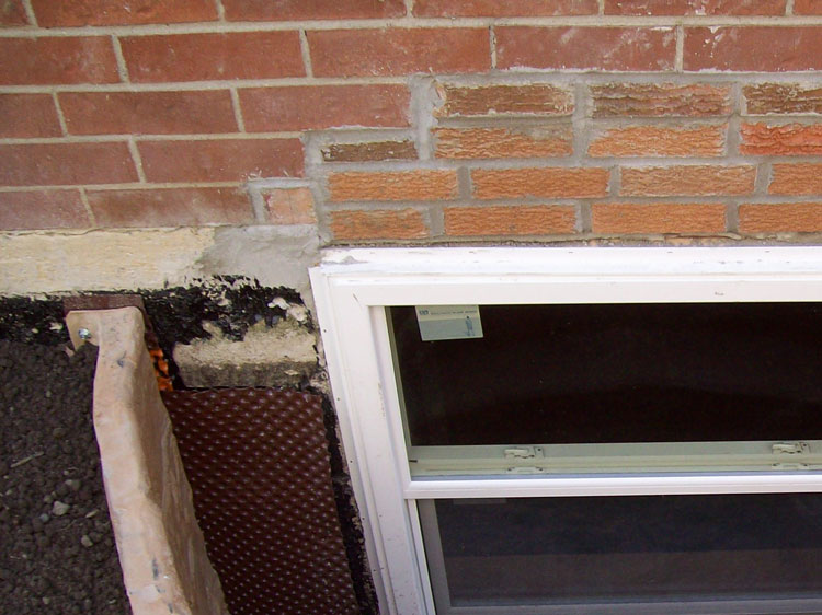 photo of window well repair